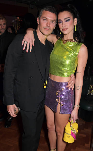 Jacob K and Dua Lipa attend an exclusive party hosted by Frieze and Versace to celebrate London's creative community at Toklas on October 15, 2021 in London, England — frame 8/20 (379×612)