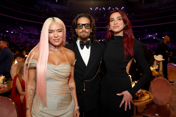Karol G, Maluma and Dua Lipa attend the 66th GRAMMY Awards at Crypto.com Arena on February 04, 2024 in Los Angeles, California — frame 48/80 (612×408)